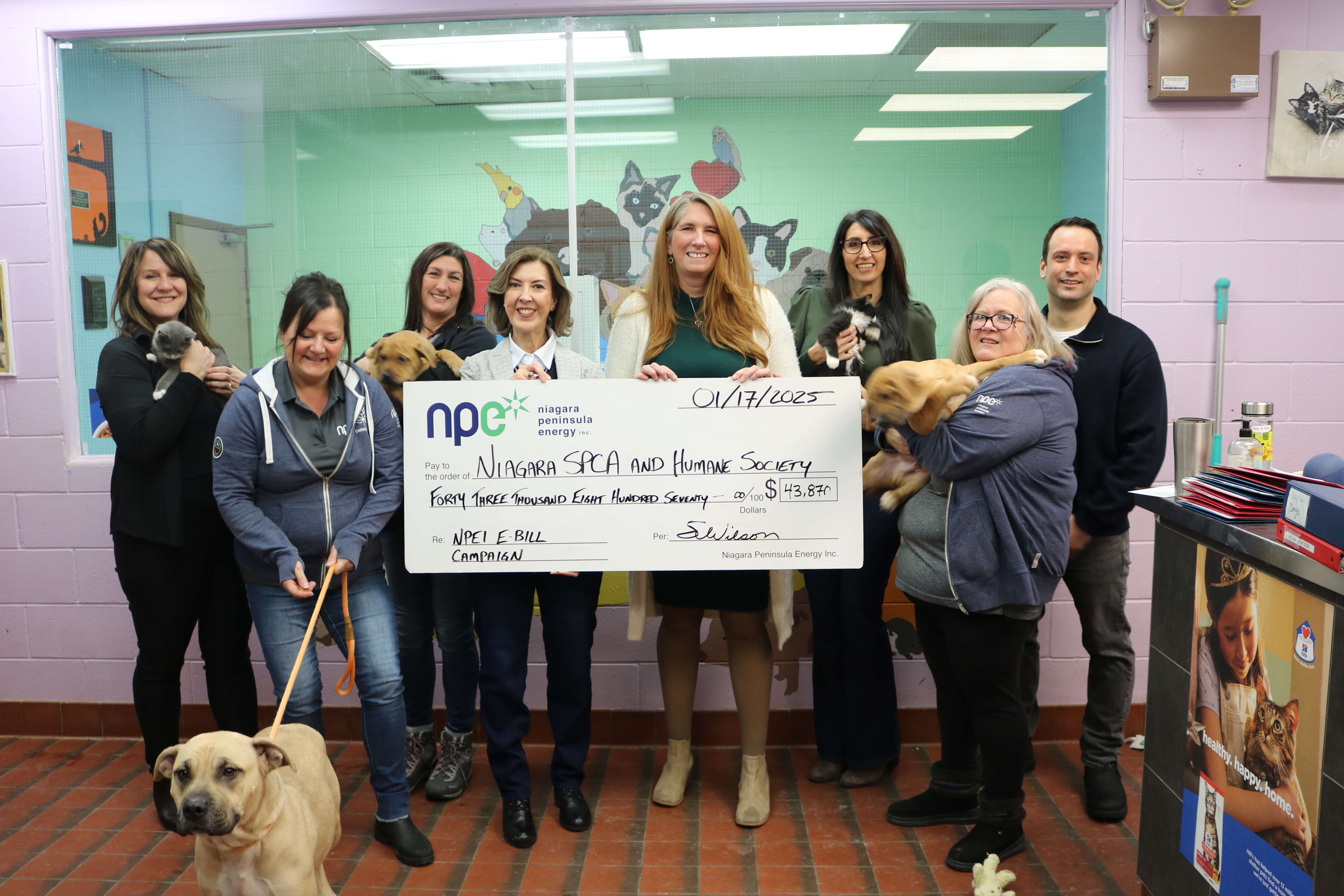 NPEI and SPCA staff with donation cheque